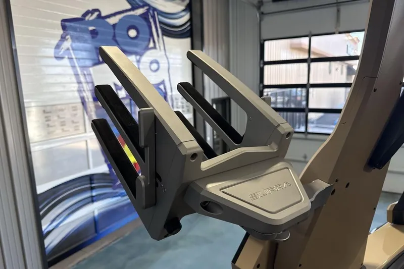 Slide: The Image of 2023 Supra SE 550 boat accessory in a showroom setting. - 22