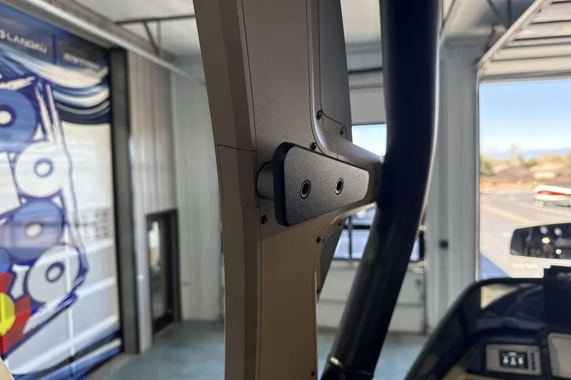 Slide: The Image of Close-up of 2023 Supra SE 550 boat interior detail in a showroom setting. - 26