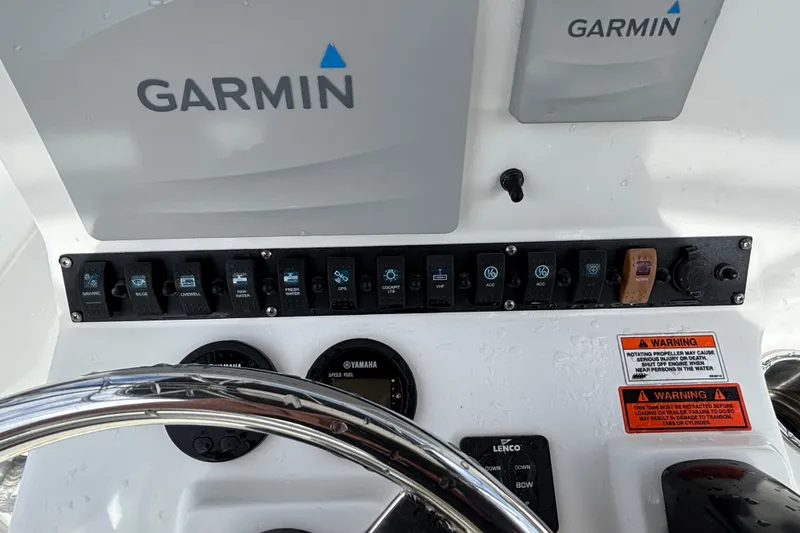 Slide: The Image of Control panel of a 2016 Sea Hunt Ultra 225 boat with Garmin navigation system. - 16