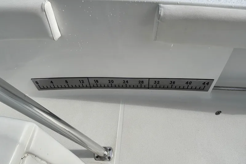 Slide: The Image of Ruler on 2016 Sea Hunt Ultra 225 boat interior for measuring fish length. - 22