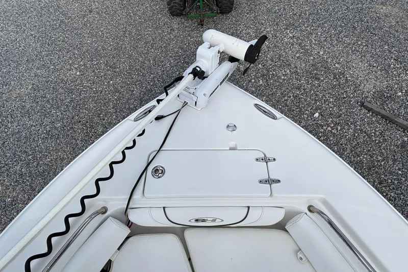 Slide: The Image of Bow view of 2016 Sea Hunt Ultra 225 boat with trolling motor. - 6