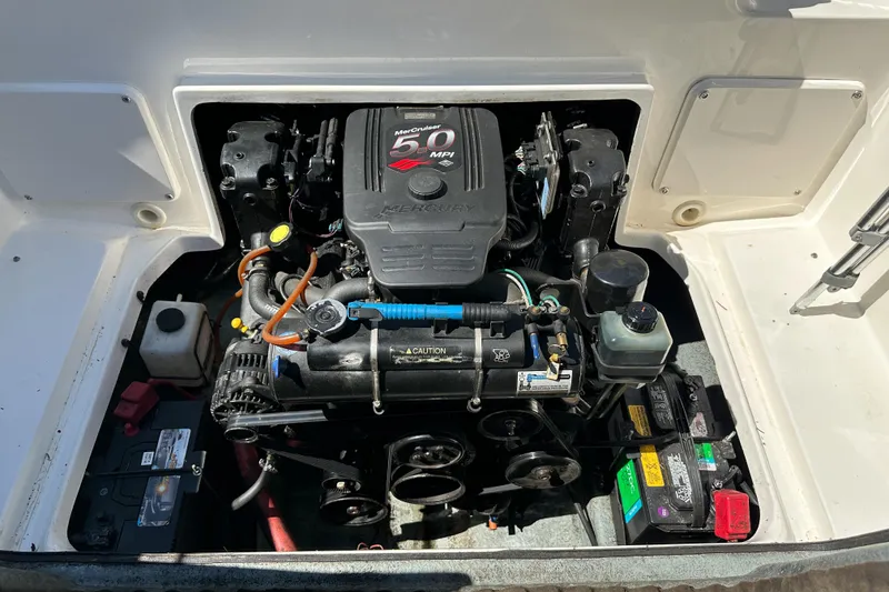 Slide: The Image of Engine compartment of a 1998 Sea Ray 215 Express Cruiser with MerCruiser 5.0 MPI engine. - 14