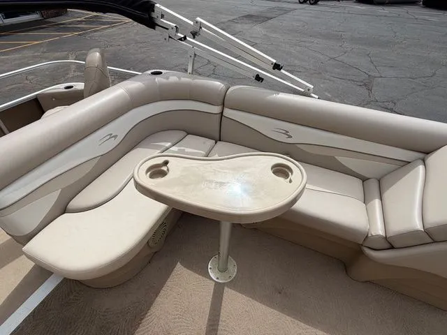 Slide: The Image of Interior of a 2012 Bennington 20 SF boat with seating area. - 22