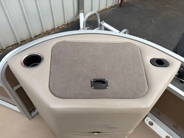 Slide: The Image of Bennington 20 SF 2012 boat console with cup holders. - 27