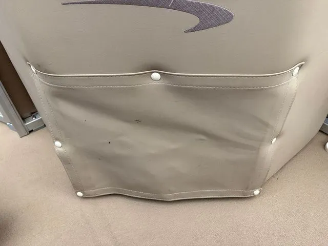 Slide: The Image of Back of a 2012 Bennington 20 SF seat with pocket. - 29