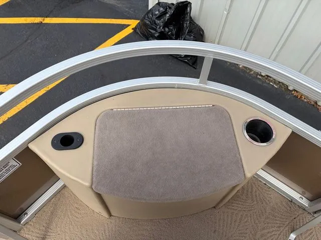 Slide: The Image of 2012 Bennington 20 SF boat interior with cup holders. - 36