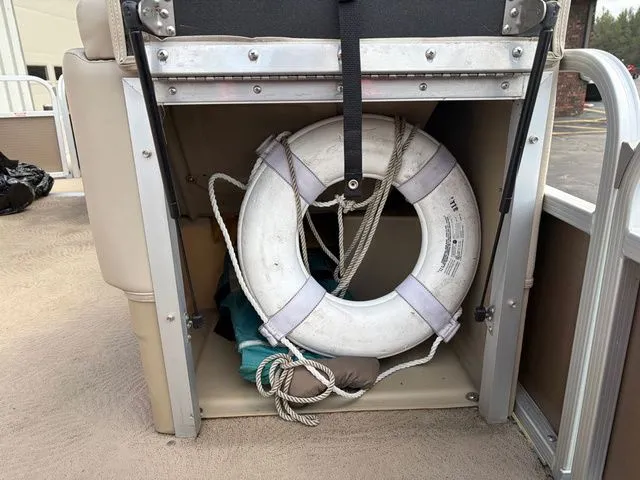 Slide: The Image of Lifebuoy in storage compartment of 2012 Bennington 20 SF boat. - 39