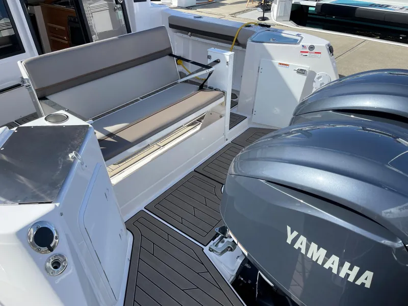 Slide: The Image of 2023 Cutwater C-288 boat with Yamaha engines and seating area. - 11