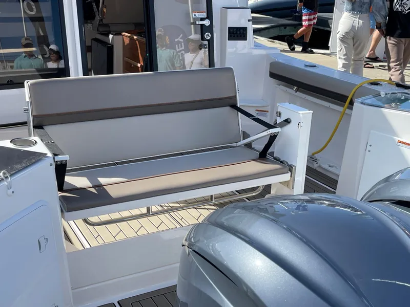Slide: The Image of 2023 Cutwater C-288 boat interior with seating and outboard motors. - 13