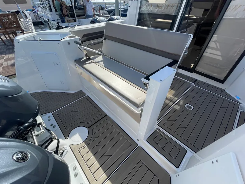Slide: The Image of 2023 Cutwater C-288 boat interior with seating and deck view. - 14