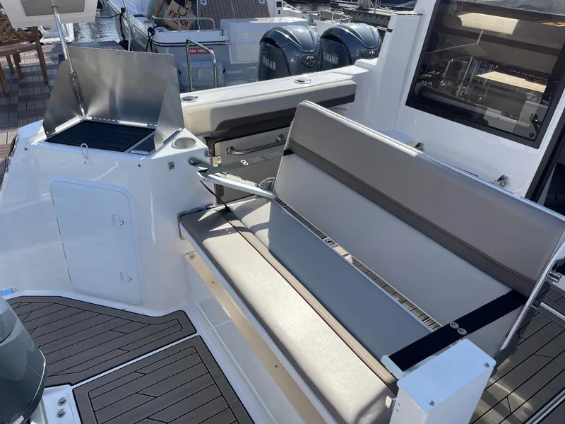 Slide: The Image of 2023 Cutwater C-288 boat interior with seating and grill station. - 16