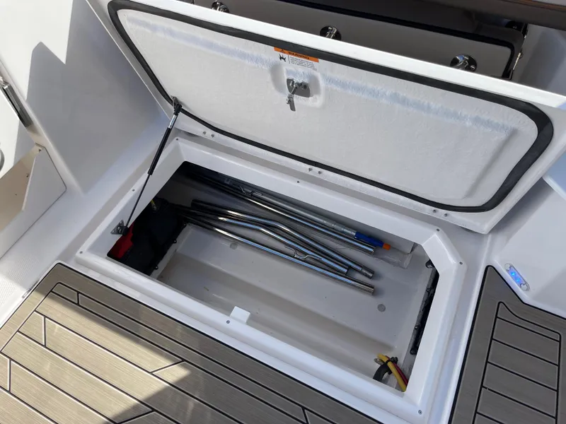 Slide: The Image of 2023 Cutwater C-288 storage compartment with equipment on deck. - 21