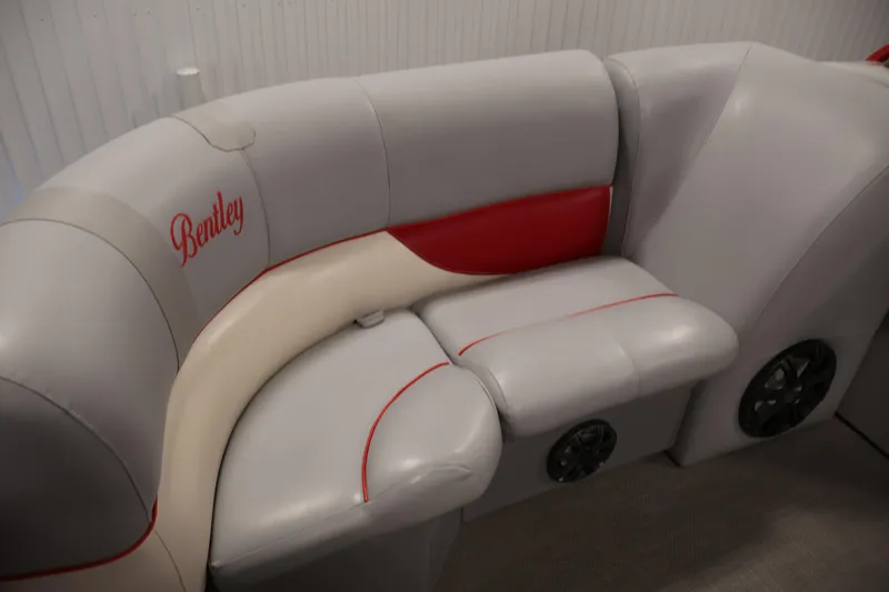 Slide: The Image of 2019 Bentley Pontoons 200 CRUISE interior seating with red and beige accents. - 13