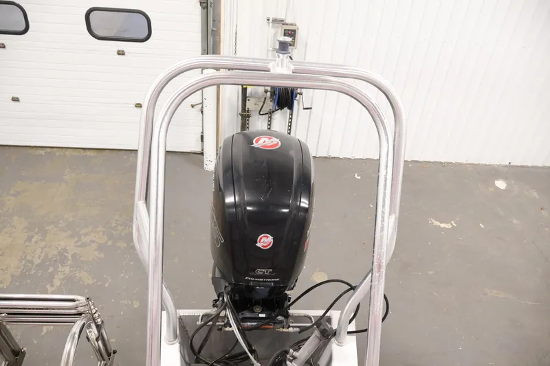 Slide: The Image of 2019 Bentley Pontoons 200 CRUISE with outboard motor in a garage setting. - 30