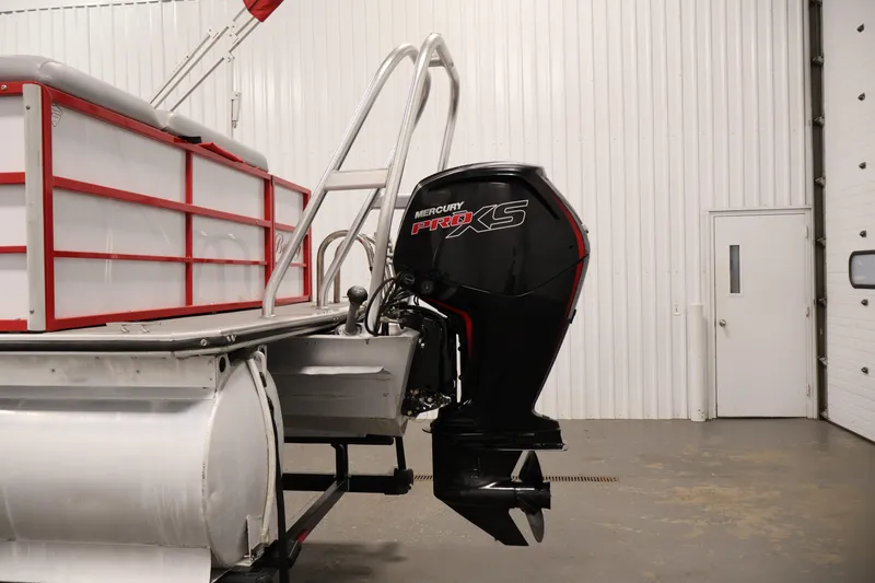 Slide: The Image of 2019 Bentley Pontoons 200 CRUISE with Mercury Pro XS outboard motor in a garage setting. - 32