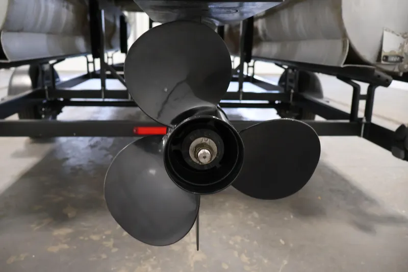 Slide: The Image of 2019 Bentley Pontoons 200 CRUISE propeller and trailer close-up in a garage. - 35