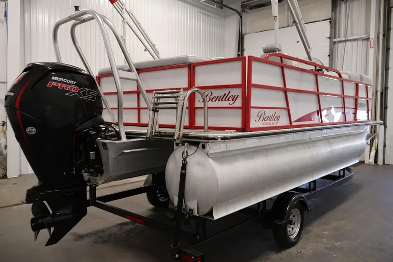Slide: The Image of 2019 Bentley Pontoons 200 CRUISE with Mercury Pro XS engine in a garage. - 5