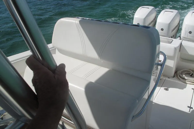 Slide: The Image of 2017 SeaVee 340B boat interior with seating and multiple outboard engines. - 11