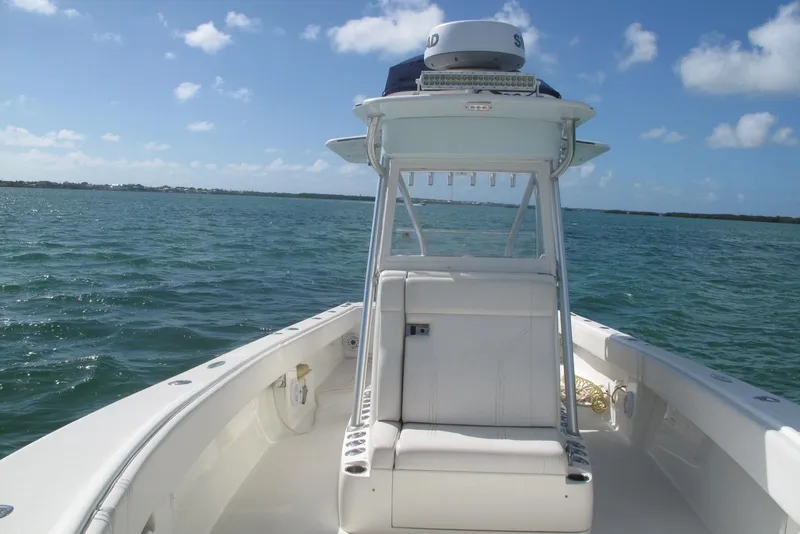 Slide: The Image of 2017 SeaVee 340B boat on open water under clear blue sky. - 13