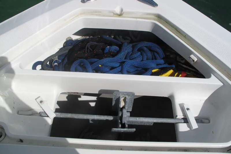 Slide: The Image of Anchor storage compartment on 2017 SeaVee 340B boat with ropes and equipment. - 14