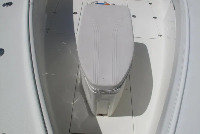 Slide: The Image of 2017 SeaVee 340B boat deck with cushioned seat and storage compartments. - 21