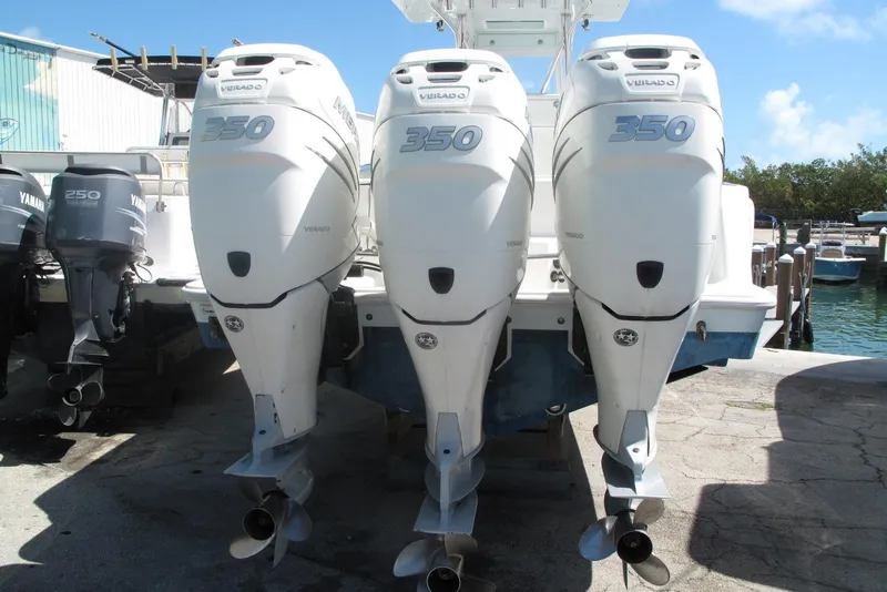 Slide: The Image of 2017 SeaVee 340B boat with triple 350 Verado outboard engines at dockside. - 25