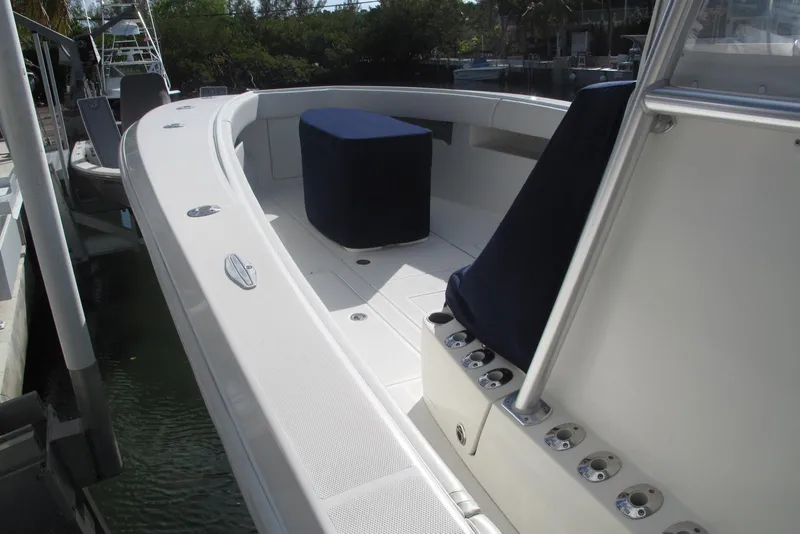 Slide: The Image of 2017 SeaVee 340B boat deck with seating and rod holders. - 6