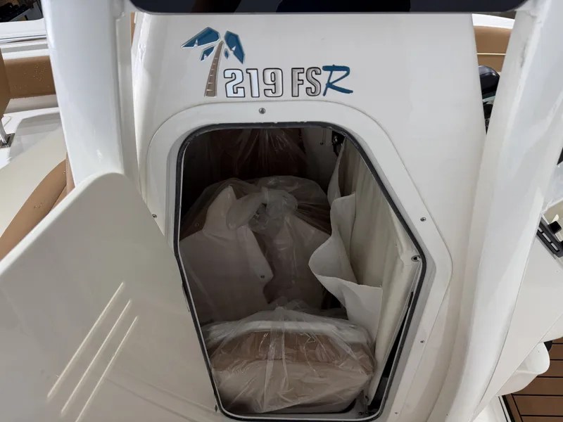 Slide: The Image of Key West 219FSR boat cabin, 2026 model, with open door. - 21