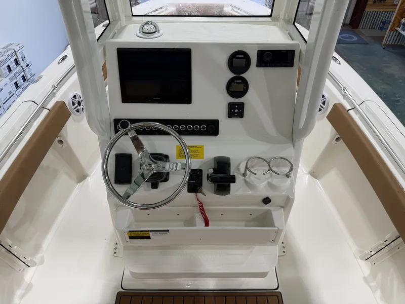 Slide: The Image of Key West 219FSR boat helm console, model year 2026. - 6