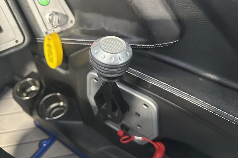 Slide: The Image of 2019 Supra SA 550 interior with gear shift and cup holders. - 16