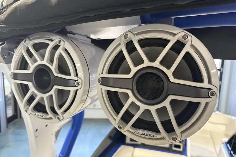 Slide: The Image of Close-up of JL Audio speakers on a 2019 Supra SA 550 boat. - 21