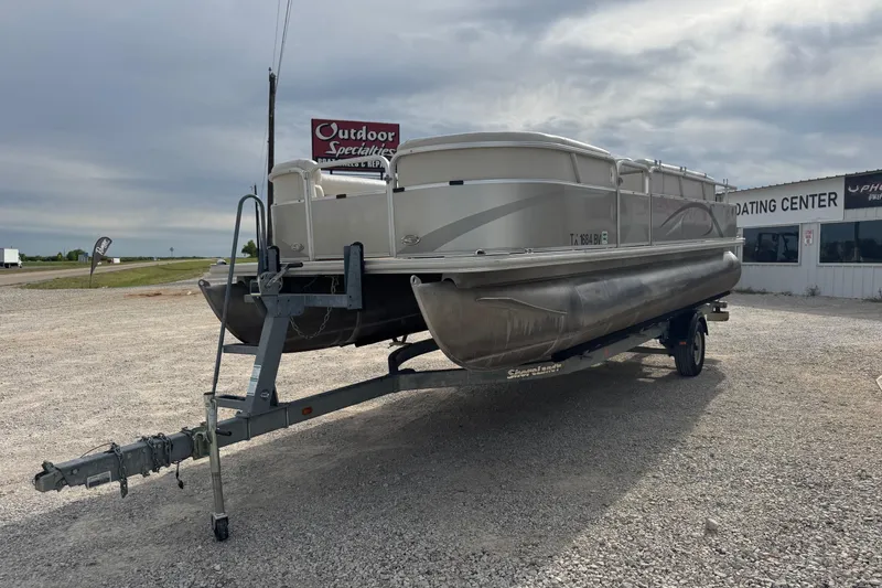 Slide: The Image of 2013 SunChaser 8522 Cruise pontoon boat on trailer at dealership lot. - 4