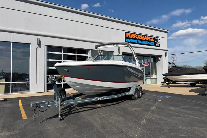 The Image of 2019 Cobalt R5 boat on trailer outside Performance Marine Watersports dealership. - 0
