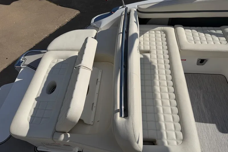 Slide: The Image of Interior of a 2019 Cobalt R5 boat with white upholstered seats. - 13