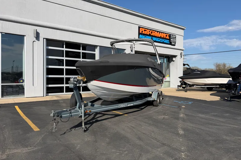 Slide: The Image of 2019 Cobalt R5 boat on trailer outside dealership, sunny day. - 29