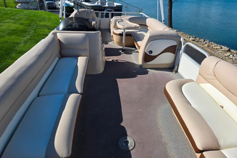 Slide: The Image of 2016 Sun Tracker Party Barge 24 DLX pontoon boat with spacious seating and scenic lake view. - 11