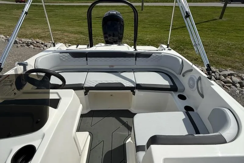 Slide: The Image of Interior of 2026 Bayliner M17 boat with seating and helm. - 10