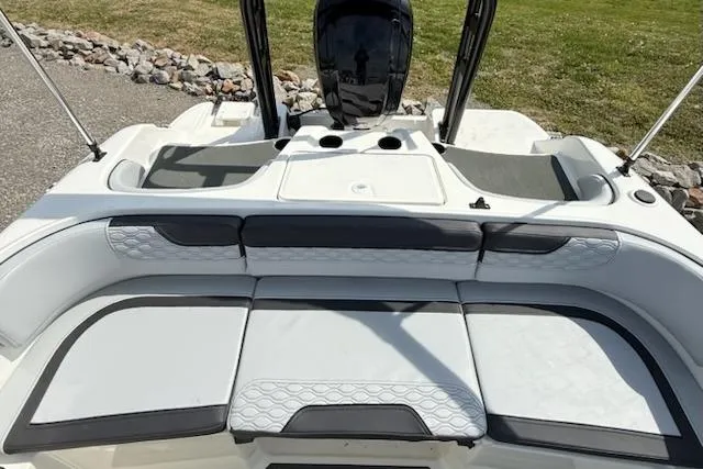 Slide: The Image of Rear view of 2026 Bayliner M17 with cushioned seating. - 12