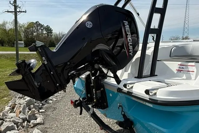 Slide: The Image of 2026 Bayliner M17 with Mercury outboard motor, side view. - 4
