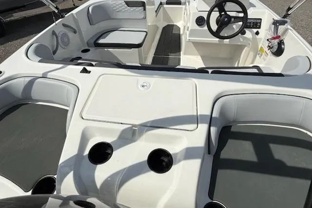 Slide: The Image of Interior of 2026 Bayliner M17 boat with seating and helm console. - 6