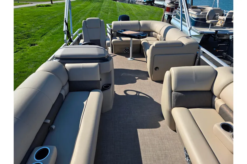 Slide: The Image of 2024 Sun Tracker Party Barge 20 DLX with spacious seating and elegant design. - 11