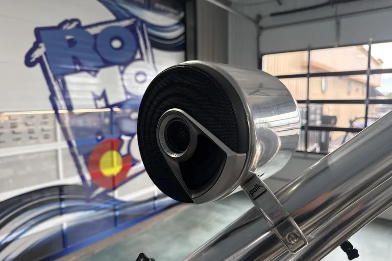 Slide: The Image of Polk speaker mounted on a Cobalt 200 boat, 1997 model, in a showroom. - 21