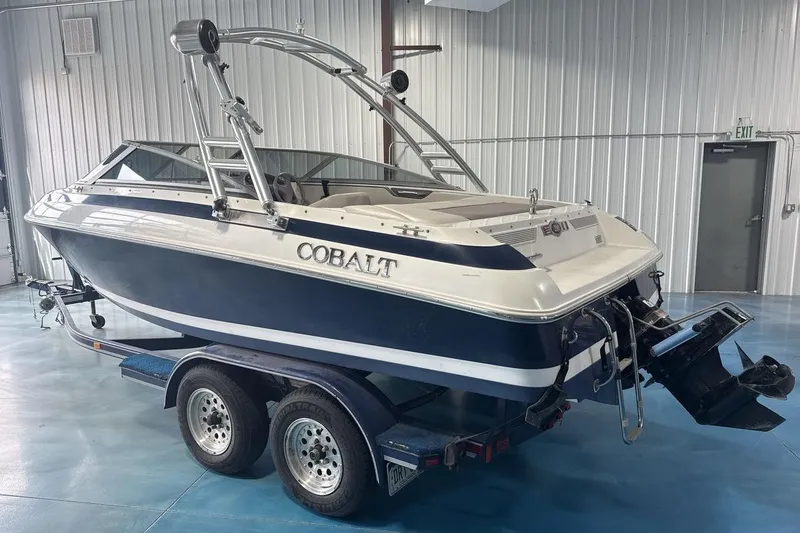 Slide: The Image of 1997 Cobalt 200 boat on trailer in indoor storage facility. - 4