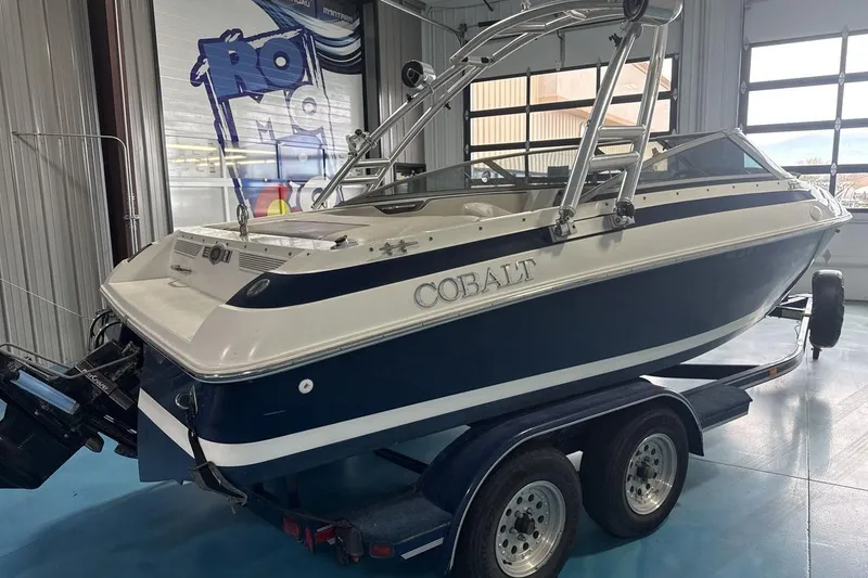 Slide: The Image of 1997 Cobalt 200 boat on trailer in indoor showroom. - 6
