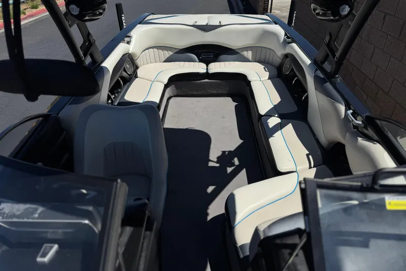 Slide: The Image of 2015 Malibu Wakesetter 247 LSV interior with spacious seating and modern design. - 16