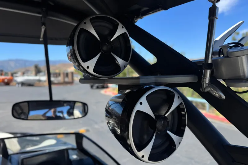 Slide: The Image of Speakers on a 2015 Malibu Wakesetter 247 LSV boat, showcasing sleek design and audio setup. - 20