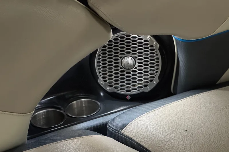 Slide: The Image of Interior of 2015 Malibu Wakesetter 247 LSV with speaker and cup holders. - 30