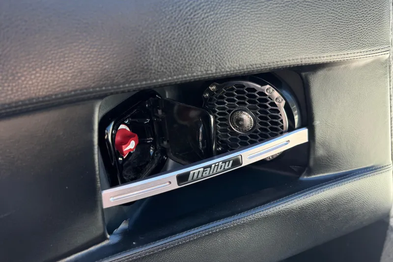 Slide: The Image of 2015 Malibu Wakesetter 247 LSV interior speaker detail with branded trim. - 31