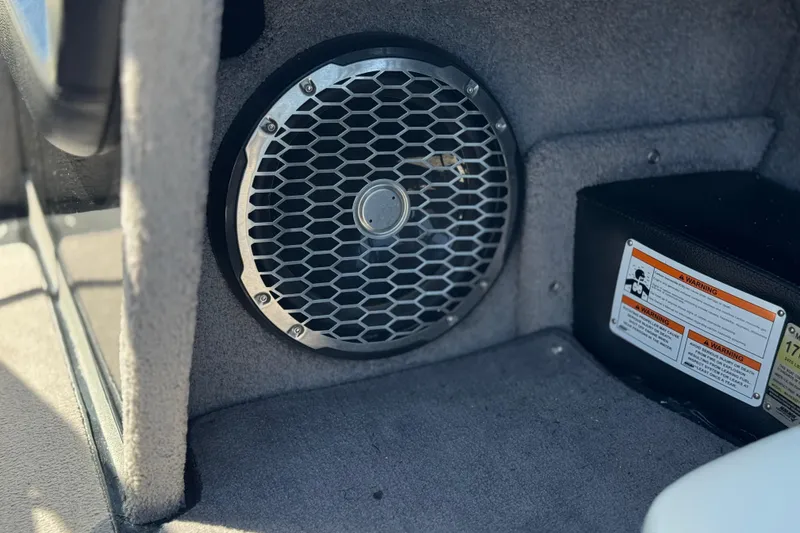 Slide: The Image of Speaker and warning label inside 2015 Malibu Wakesetter 247 LSV boat interior. - 34
