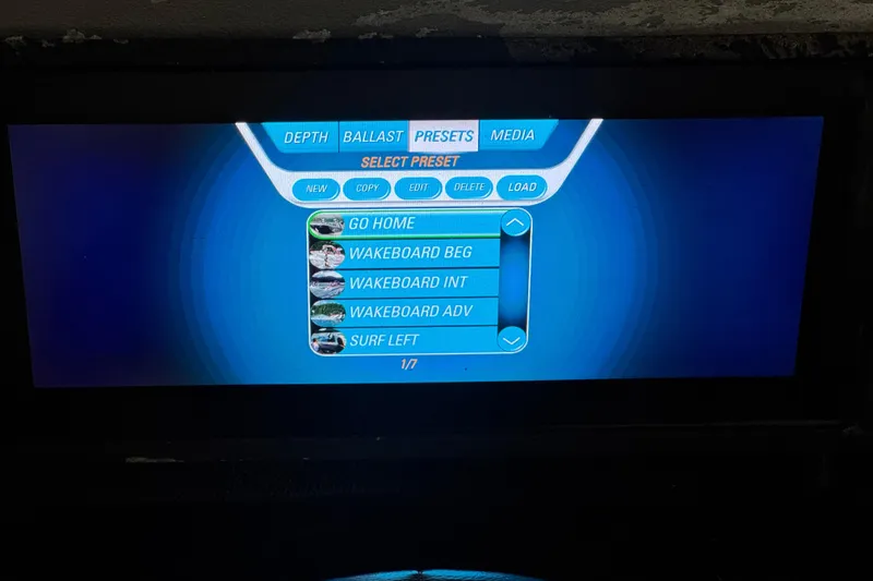 Slide: The Image of Touchscreen display of a 2015 Malibu Wakesetter 247 LSV showing wakeboarding presets. - 40